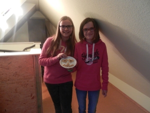 My host sister, Anna, and her friend with cookies they brought up for me .  :)